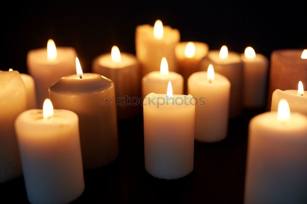 Similar – Many colourful burning candles