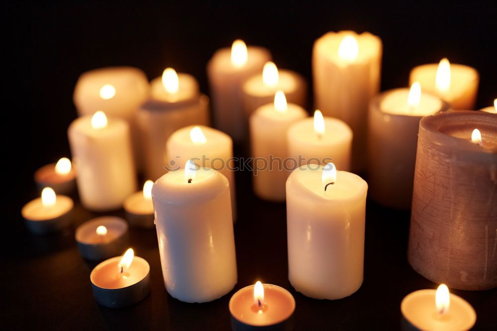 Similar – Image, Stock Photo A match lights the fire of many candles