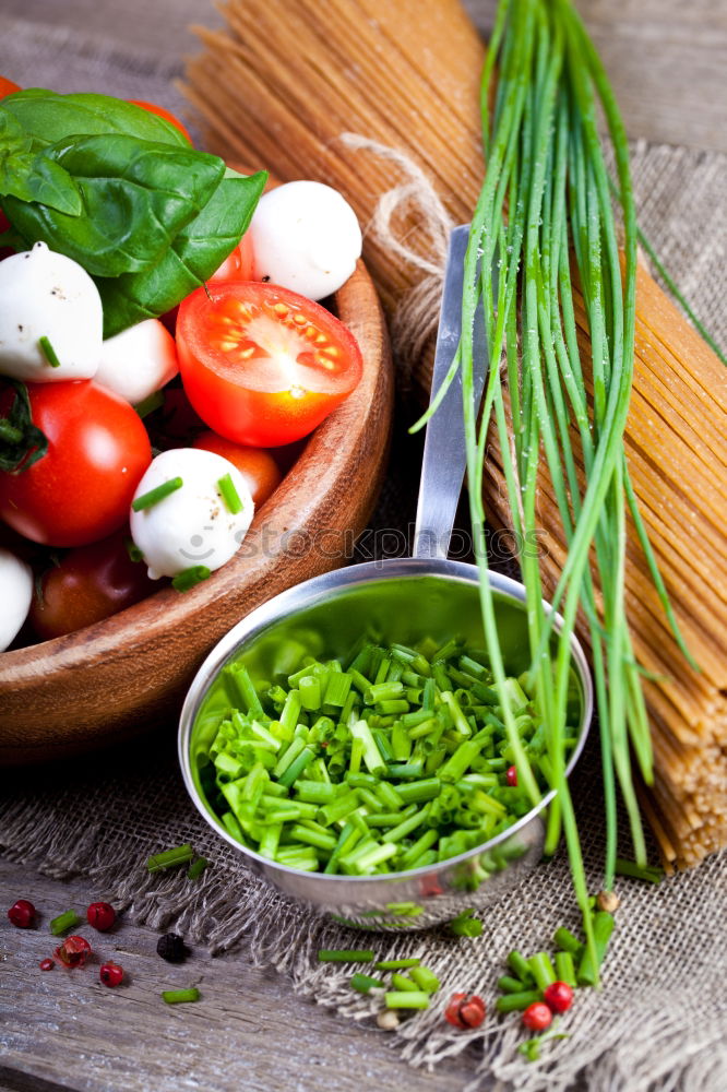 Similar – Bsilikum Pesto with spaghetti and tomatoes