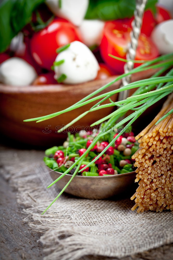 Similar – Image, Stock Photo Whole wheat pasta, vegetables, herbs and olive oil