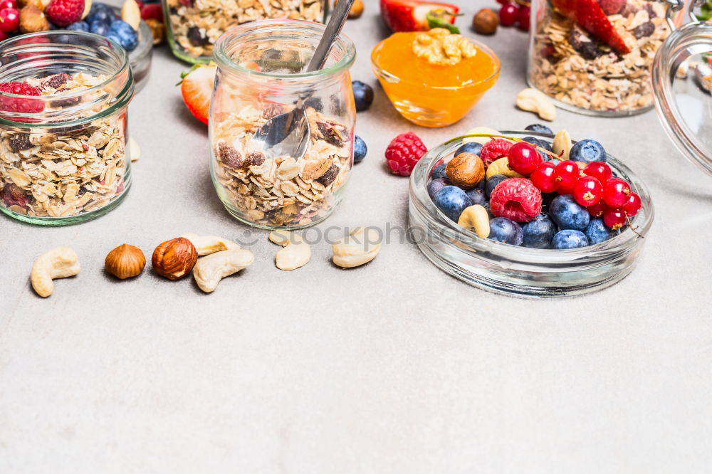 Similar – Image, Stock Photo Breakfast in glass with fresh berries, nuts and muesli