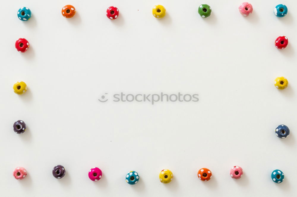 Similar – Image, Stock Photo Number 3 laid out of small chocolate candies with colored sugar sprinkles on white background