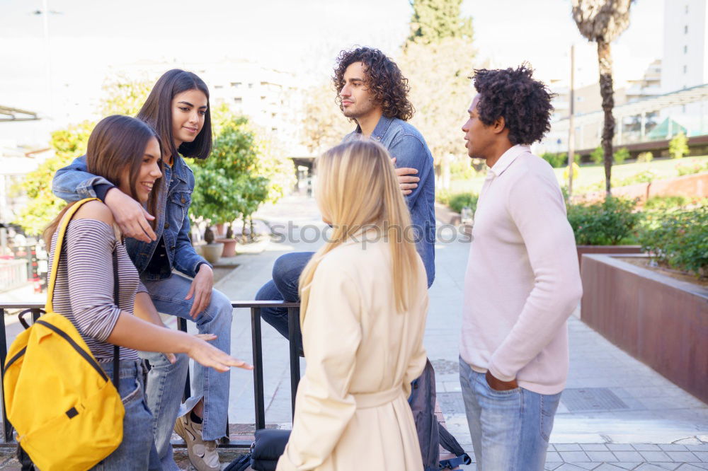 Similar – Image, Stock Photo Multi-ethnic group of young people having fun together outdoors in urban background