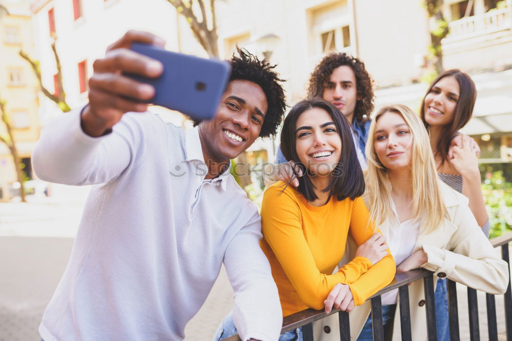 Similar – Image, Stock Photo Multi ethnic group of young adult friends taking selfie