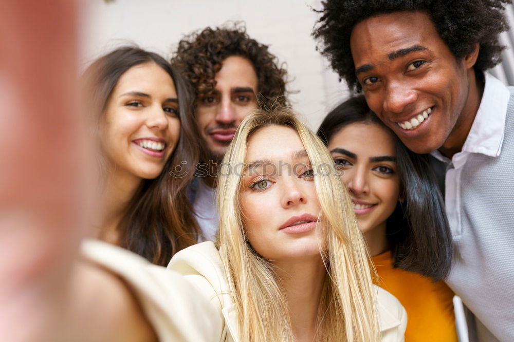 Similar – Image, Stock Photo Multiracial group of friends taking selfie in a urban street with a blonde woman in foreground