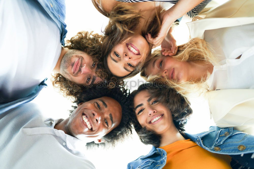 Similar – Image, Stock Photo Group of young people together outdoors in urban background.