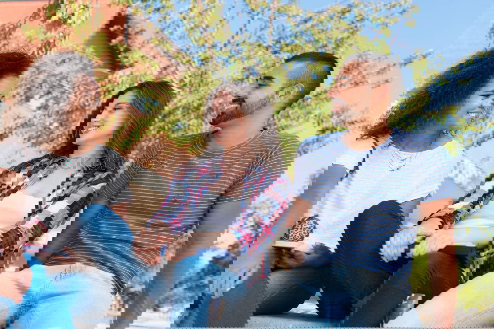 Similar – Image, Stock Photo Multi-ethnic group of young people having fun together outdoors in urban background