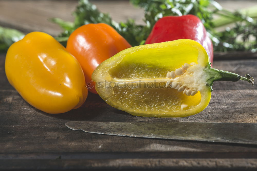 Similar – Multicolored peppers on wood