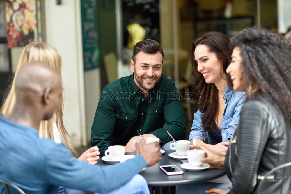 Image, Stock Photo Multiracial group of five friends having a coffee together.