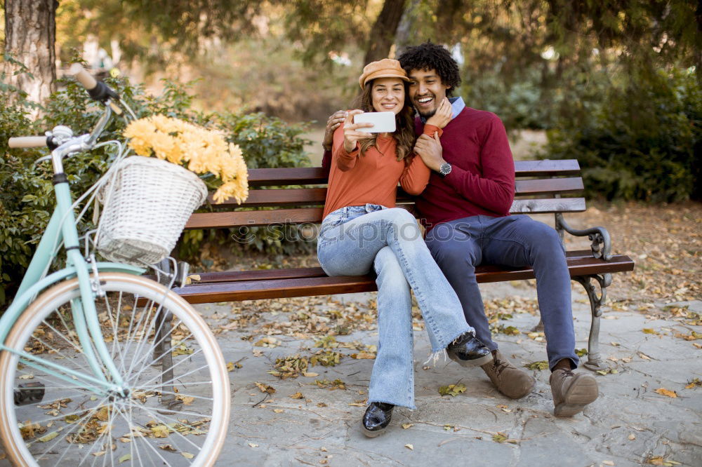 Similar – Mixed race couple having wine together on summer day