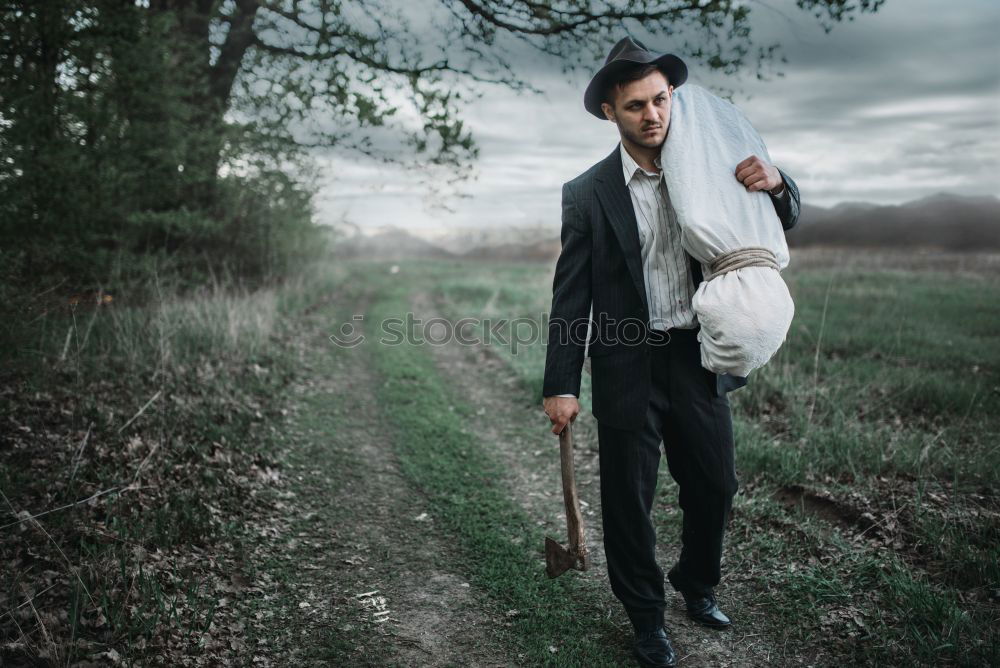 Similar – A Young Man standing in the woods