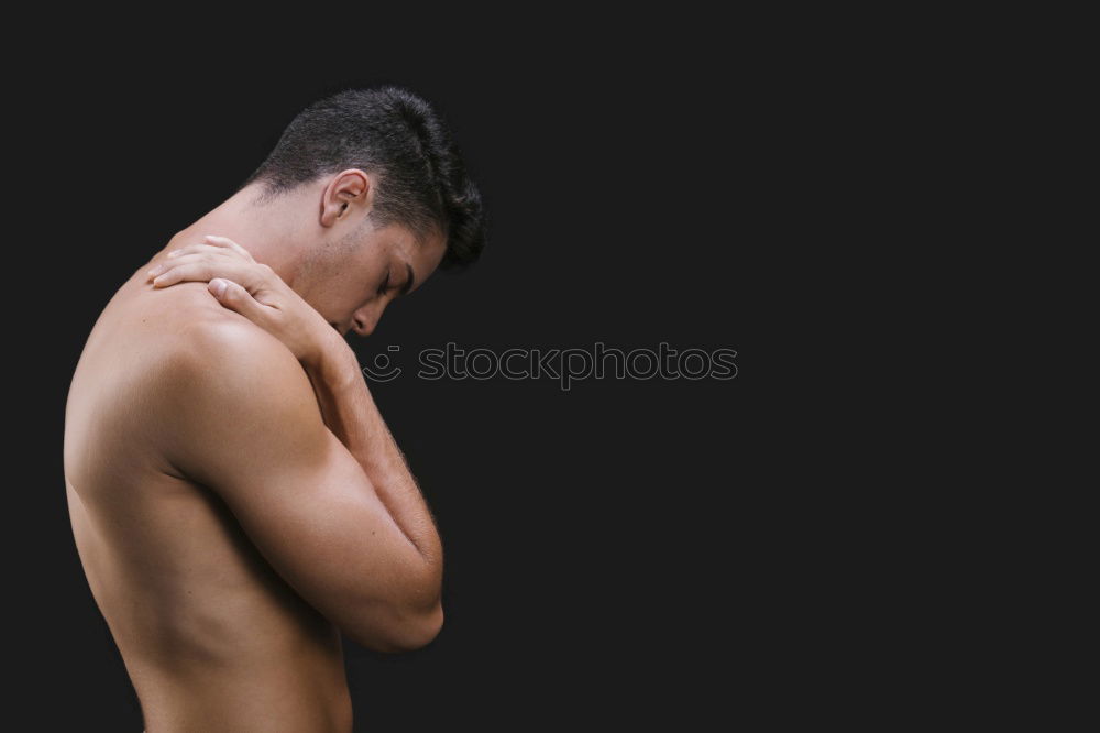 Topless curly woman in studio