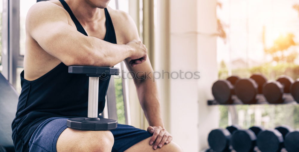 Similar – Image, Stock Photo Man stretching and woman doing dumbbells exercises in gym