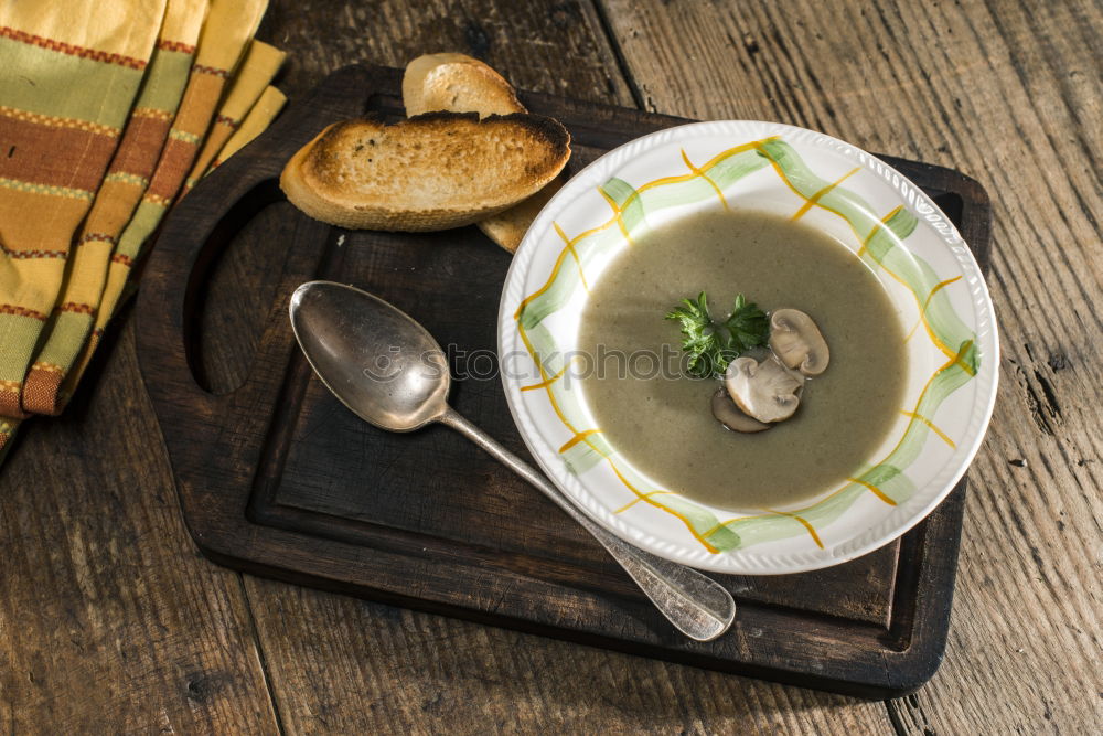 Similar – Image, Stock Photo Broccoli cream soup with roasted brown bread