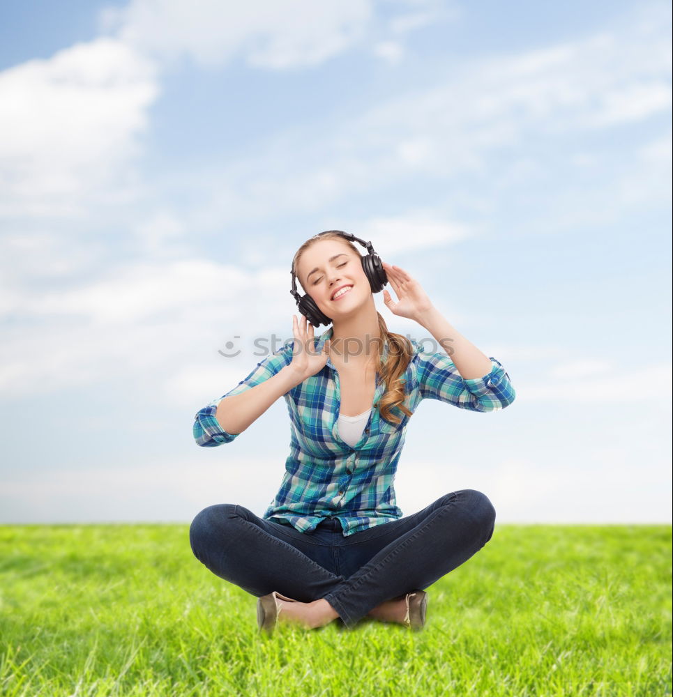 Similar – Women wearing t-shirt and jeans stays outdoor in the park