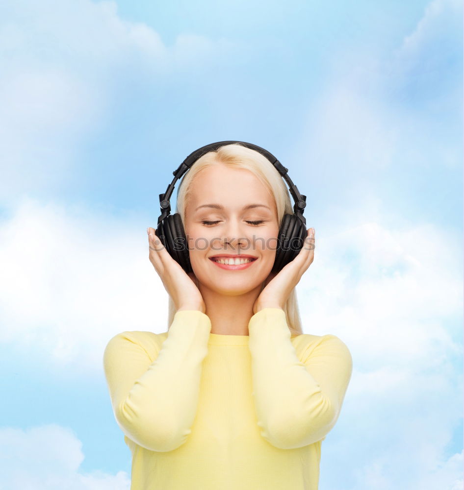 Cheerful woman in yellow jacket