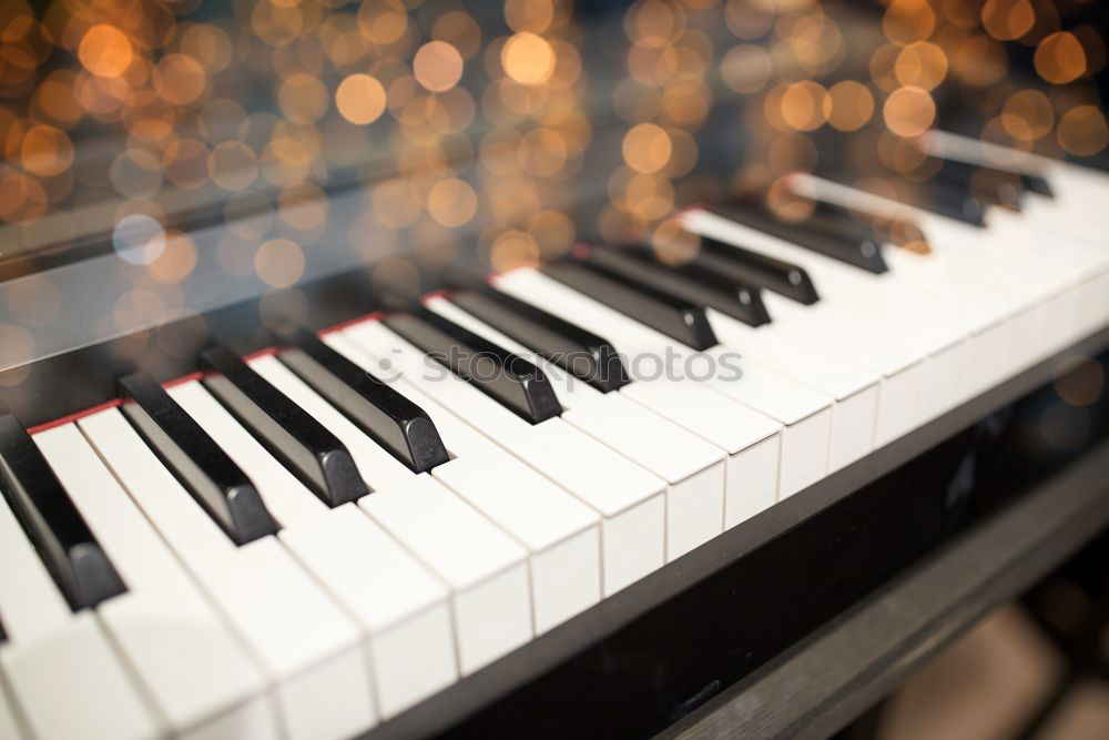 Similar – Image, Stock Photo Close up of hands of person playing piano