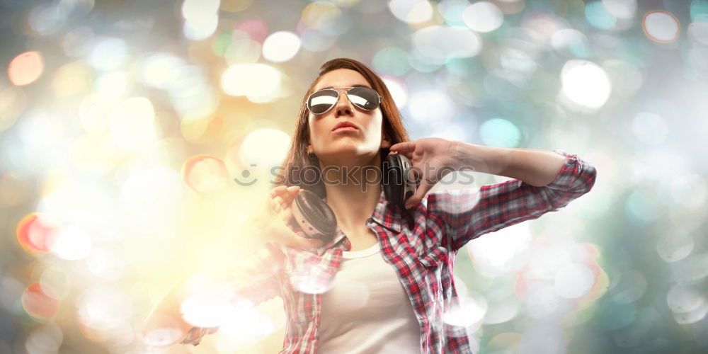 Similar – Who am I? Young woman holding a mirror in front of her face. Faceless, identity not recognizable, the mirror is showing her backhead. Hiding her face.