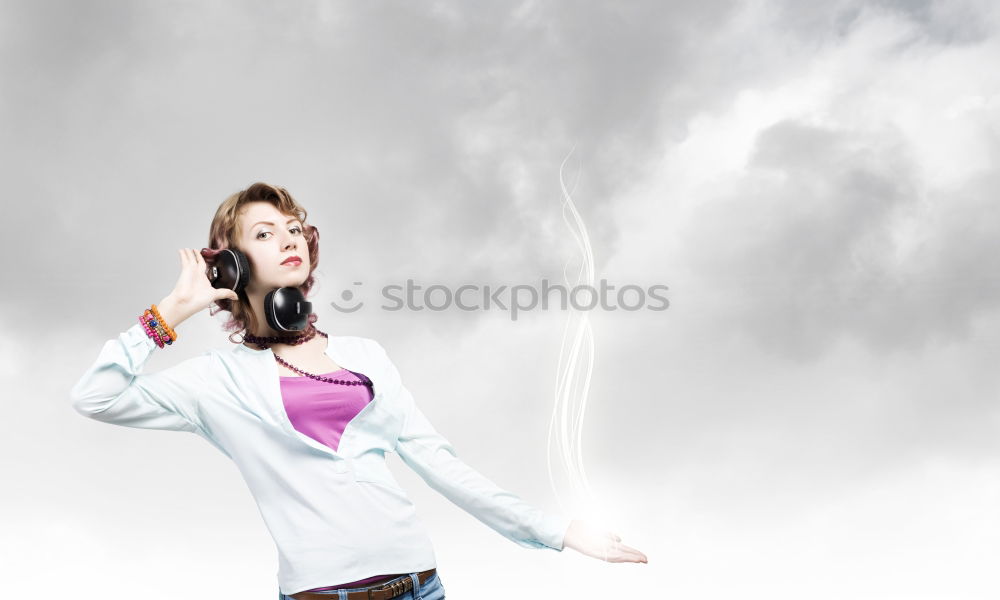 Similar – Image, Stock Photo A woman with a red cap stands in front of a wind turbine. Climate change. Alternative power generation. Renewable energy