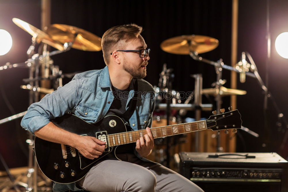 Similar – Image, Stock Photo outdoor photo session with a bass player and his instruments