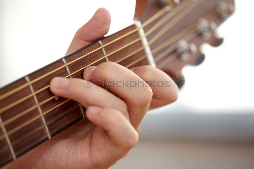 Similar – Foto Bild Eine Frau spielt barfuß Gitarre