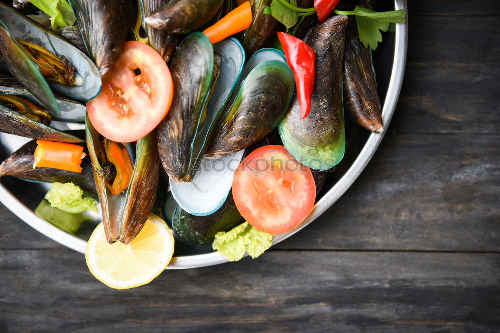 Similar – Image, Stock Photo Fresh mussels in a pot with herbs and spices