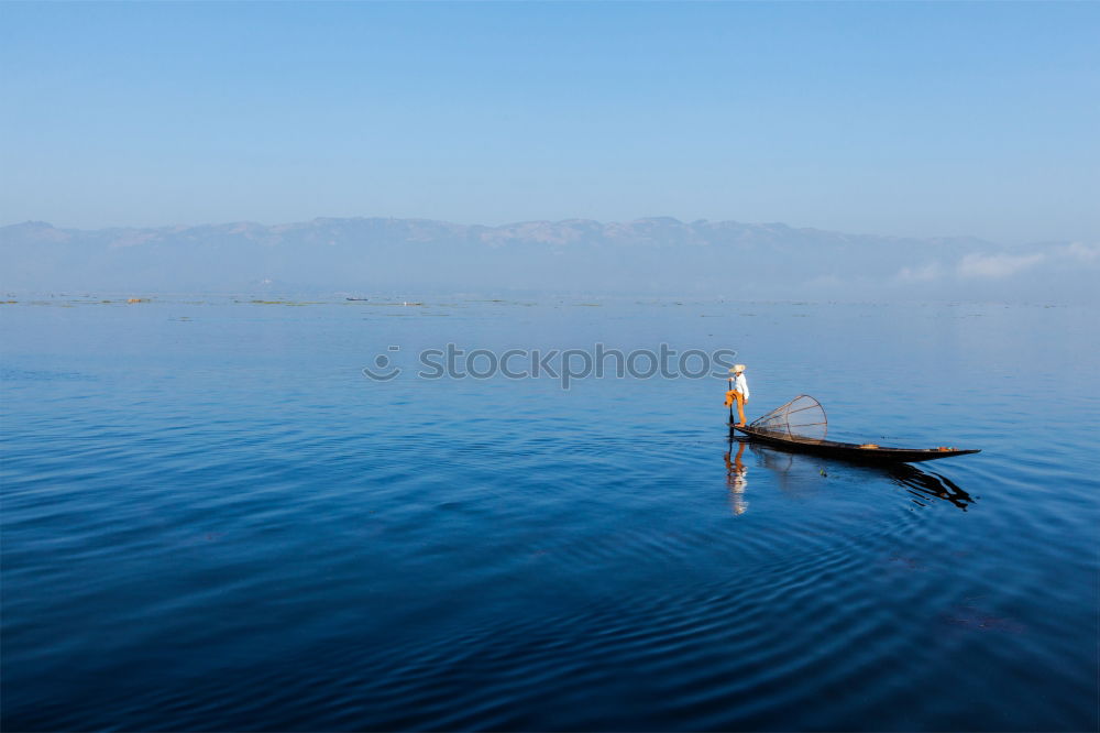 Similar – Fisher at bright Inle Lake