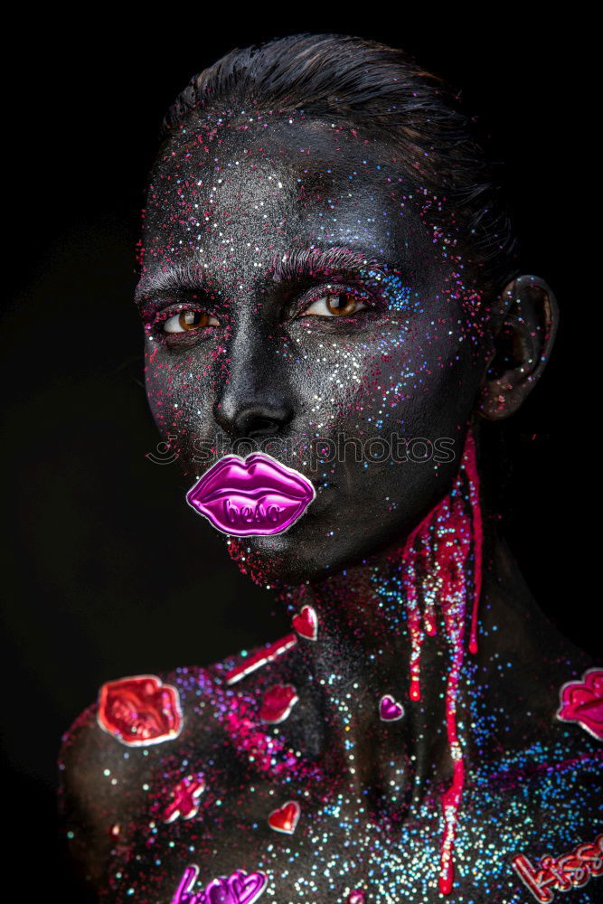 Young girl with creative makeup with butterflies