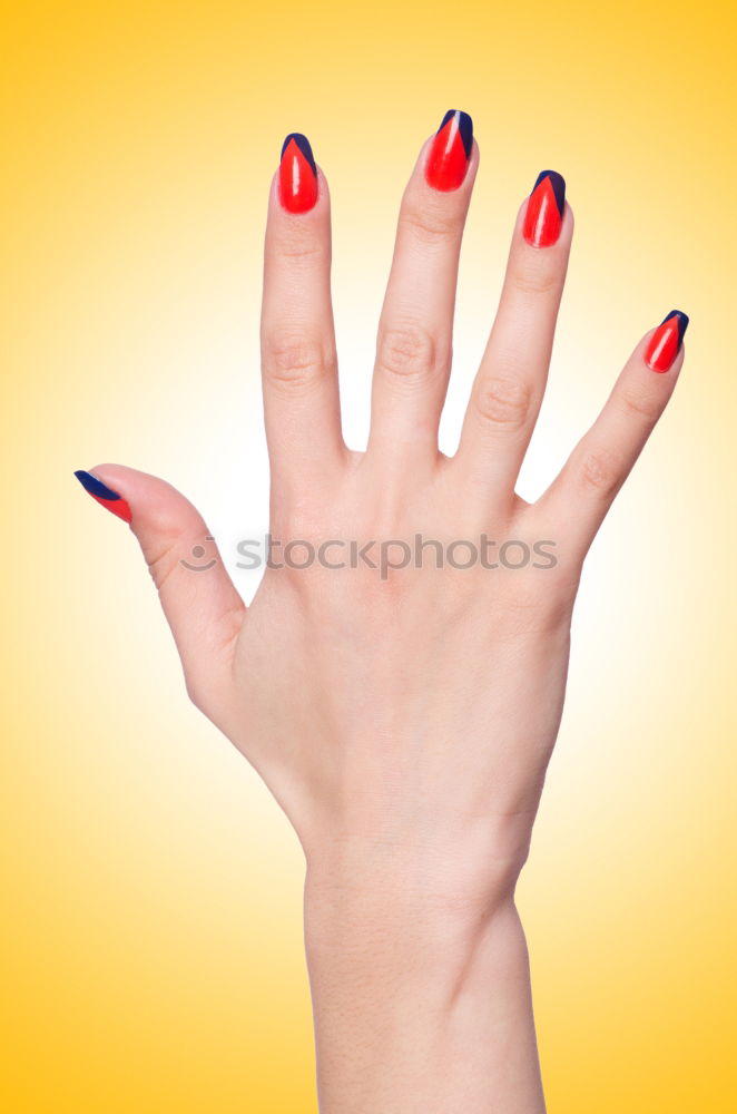 Similar – Image, Stock Photo Forearm and hand with spread fingers against a yellow background