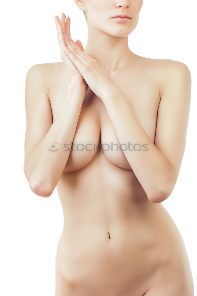 Similar – Image, Stock Photo Alluring young naked woman covering her breasts and front of her torso with a fresh clean white a towel as she looks at camera with a sultry expression and parted lips over a white studio background