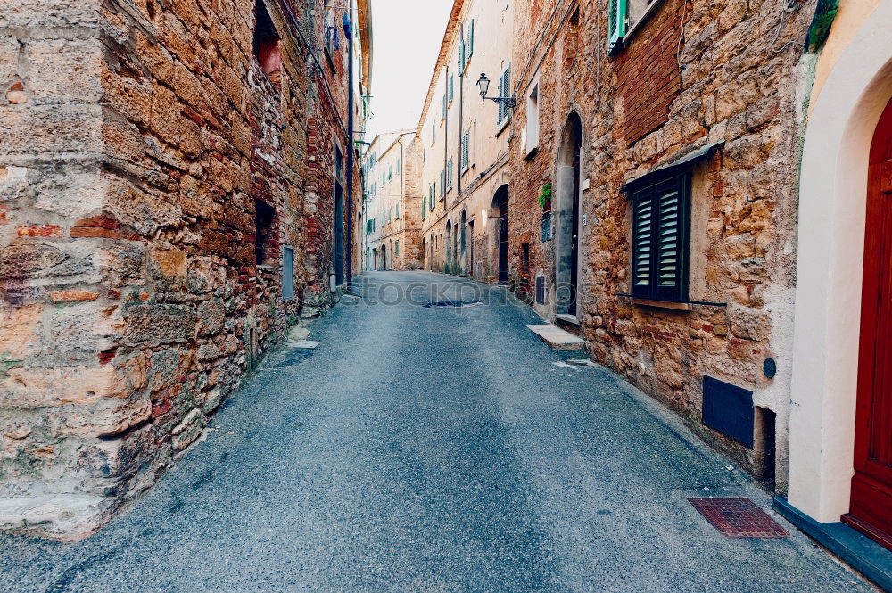 Similar – The narrow streets with tall buildings