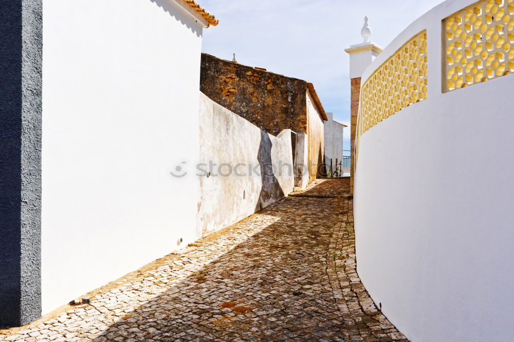 Similar – Beco de tampas de bueiros