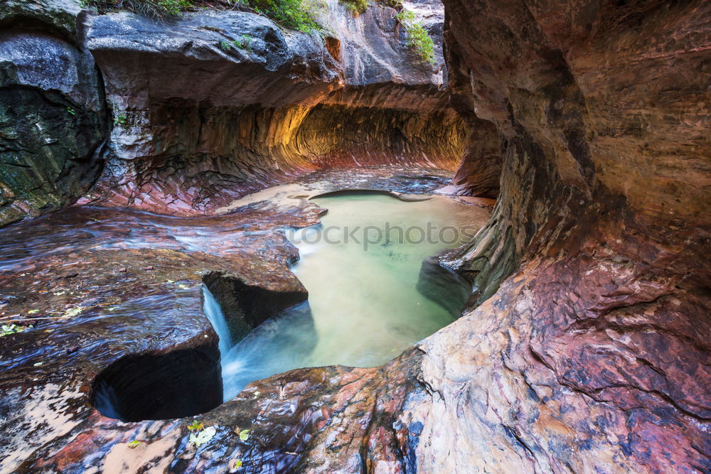 Similar – Image, Stock Photo All year round water bearing billabongs overhanging several red rocks. Framed by bushes. The tourist destination in the Red Centre- Garden of Eden.Kings Canyon. Outback Northern Territory. Australia.