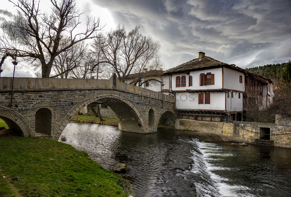 Similar – Image, Stock Photo stone bridge of an ancient village under cloudy sky