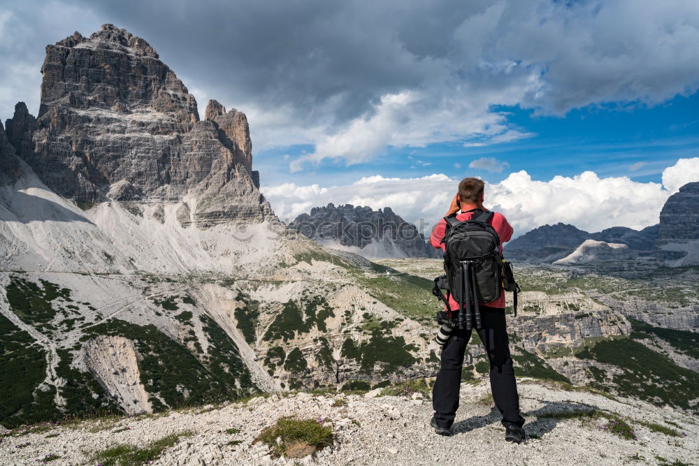 Similar – Woman tourist in mountains