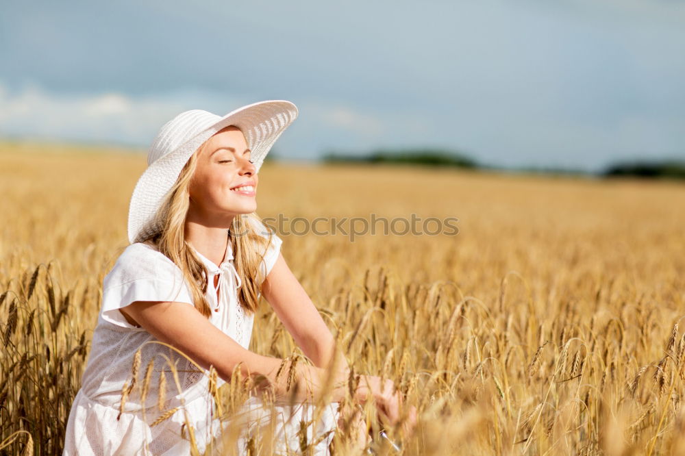 Similar – Image, Stock Photo Back view of a young woman in nature in a sunny autumn day