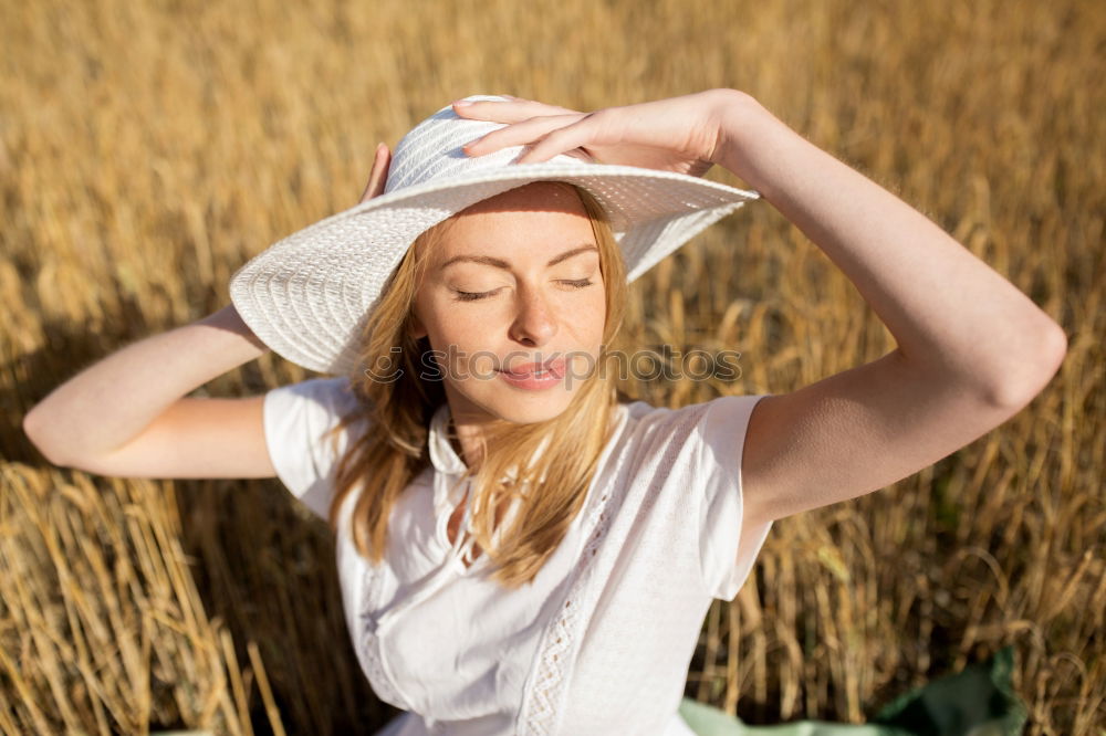 Similar – Image, Stock Photo Young cowgirl in a field of cereals