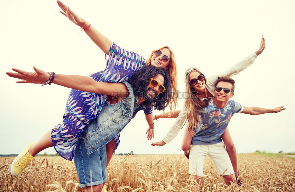 Similar – Image, Stock Photo Group of hipster friends cheering with confetti in sunset