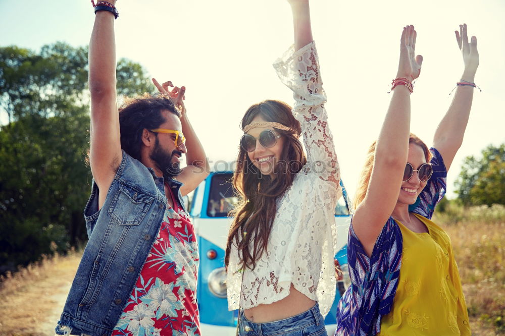 Similar – Image, Stock Photo Group of hipster friends cheering with confetti in sunset