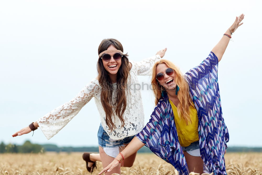 Similar – Two Girls Friend Laughing and having a good time in a sunny day