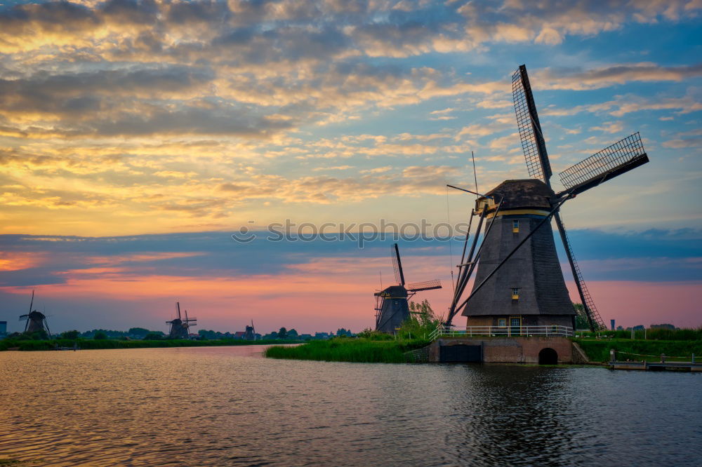 Similar – Image, Stock Photo charming windmill by lake at misty sunrise