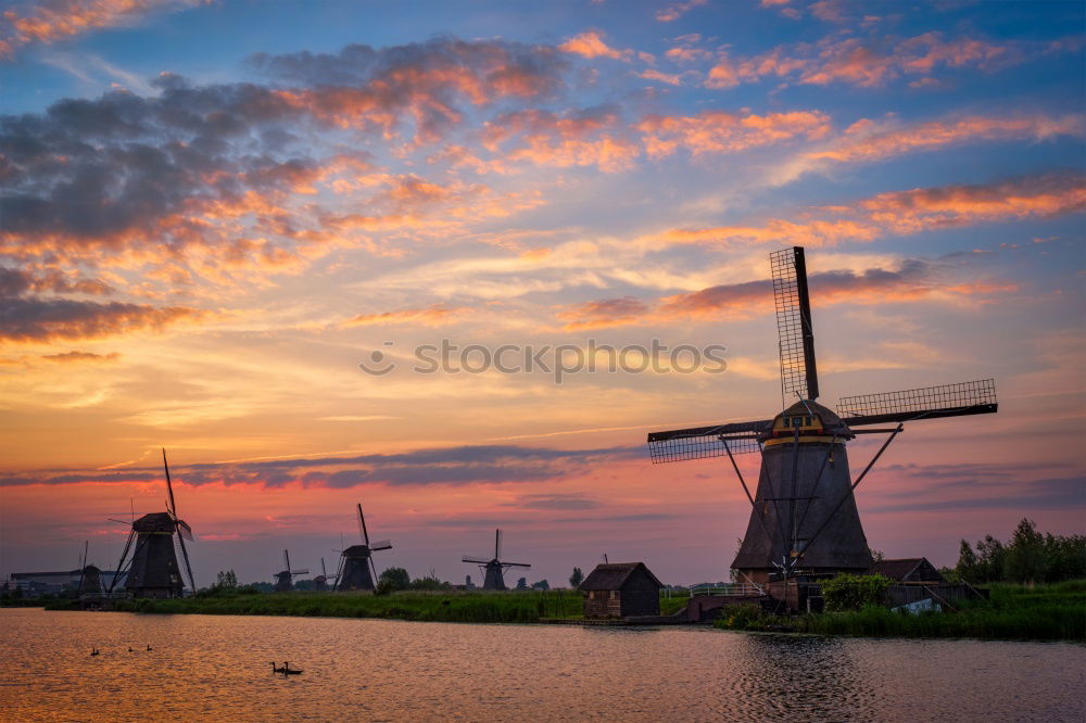 Similar – Image, Stock Photo charming windmill by lake at misty sunrise