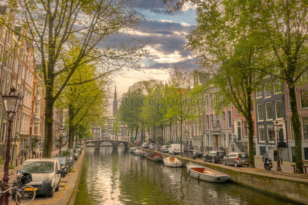 Similar – Image, Stock Photo Woman looking at sunset at one of the canals in Amsterdam