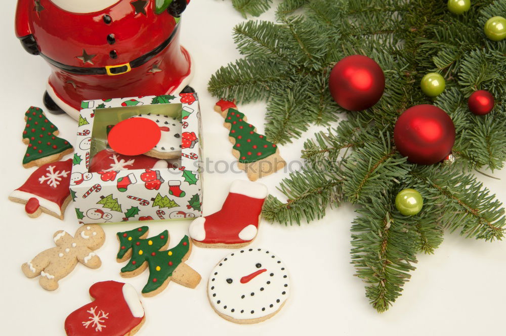 Similar – Image, Stock Photo Mother and son decorating Christmas biscuits at home