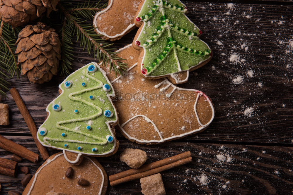 Similar – Image, Stock Photo Yellow cookies lying on the table with Christmas tree and gifts