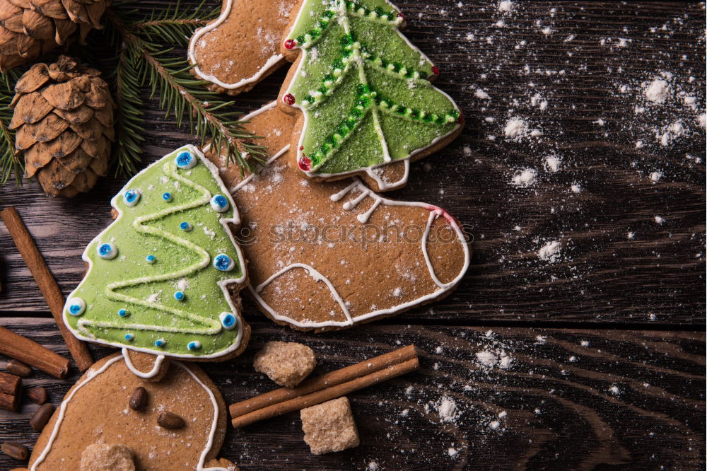 Similar – Image, Stock Photo Yellow cookies lying on the table with Christmas tree and gifts