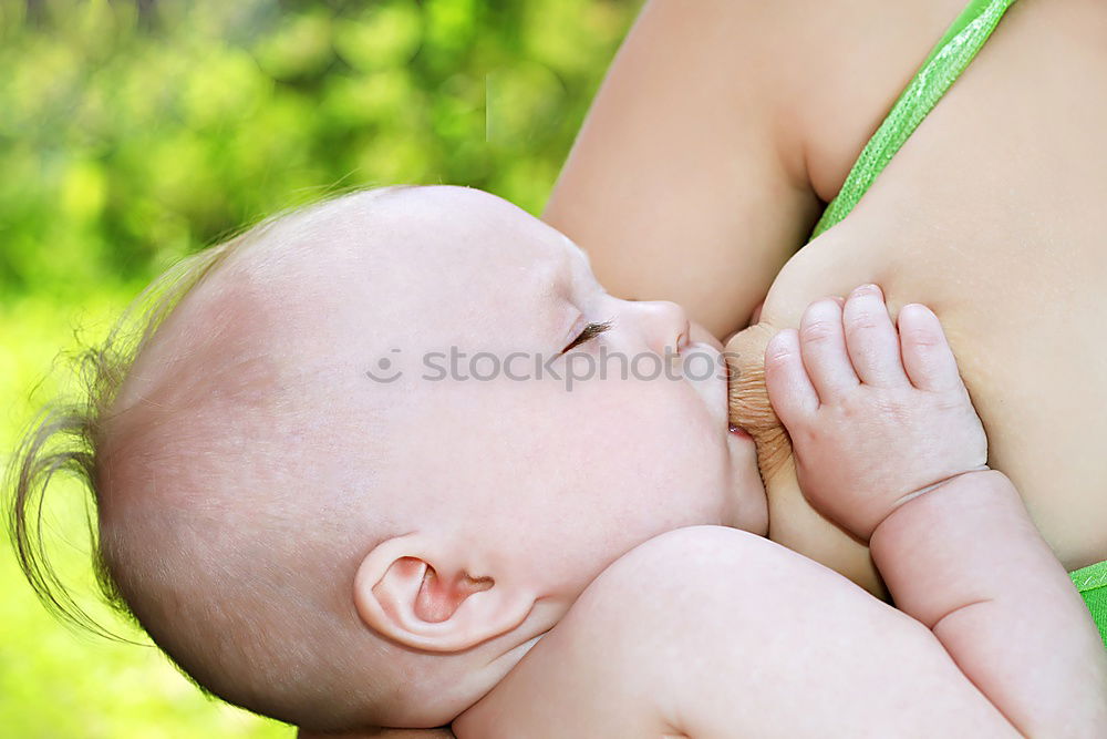 Similar – Image, Stock Photo Baby sucks on a bottle.