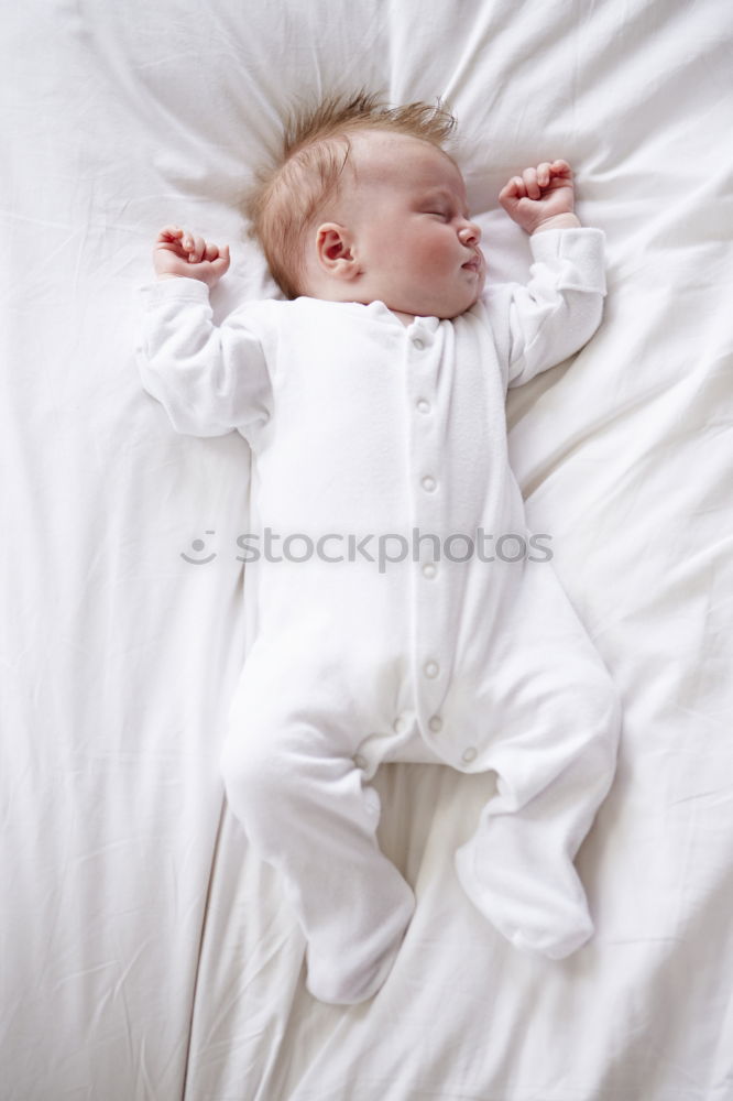 Similar – Image, Stock Photo Newborn baby girl sleeping on blue sheets at home