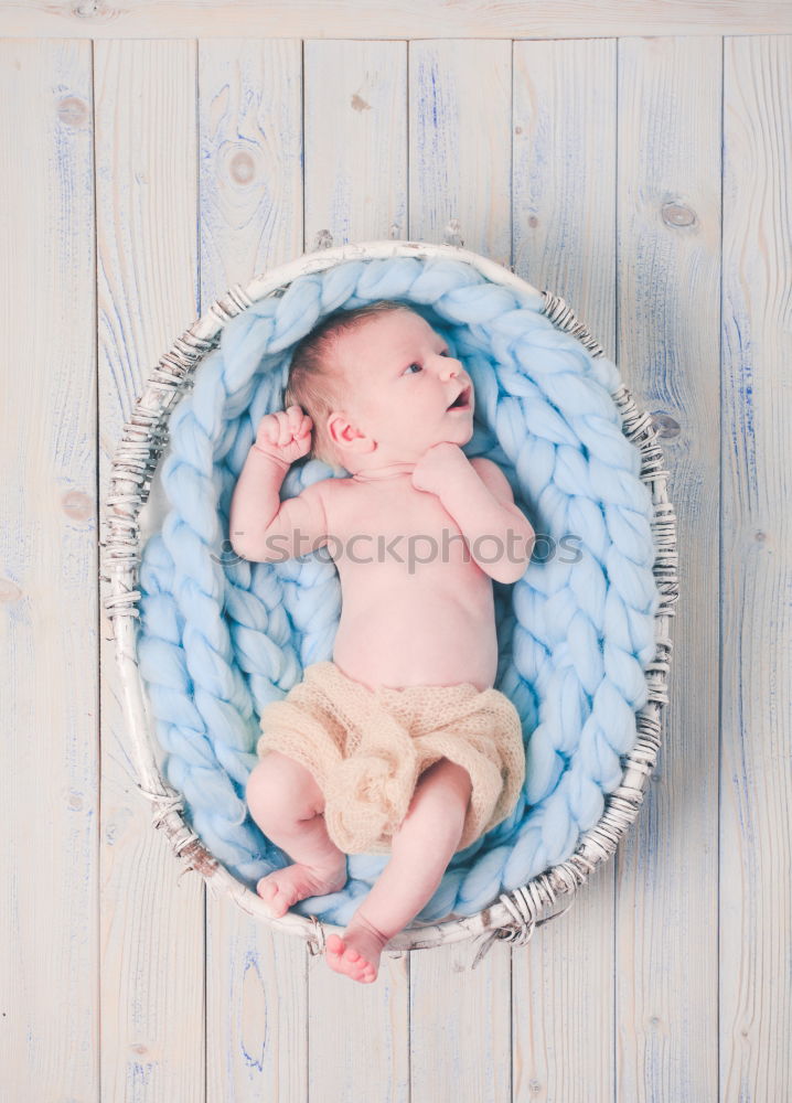 Similar – Image, Stock Photo Newborn baby resting lying above of travel suitcase