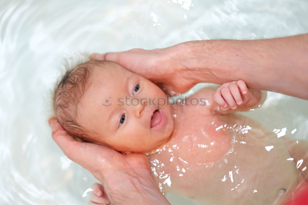 Similar – Image, Stock Photo Newborn taking bath